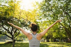 Image of a woman in a park with her arms stretched out. Are you dealing with stress symptoms in North Carolina? Do you help with stress management in Asheville or Charlotte? Then our online therapist are here for you. We can help you find the root cause in online therapy in North Carolina. Call today to get started!